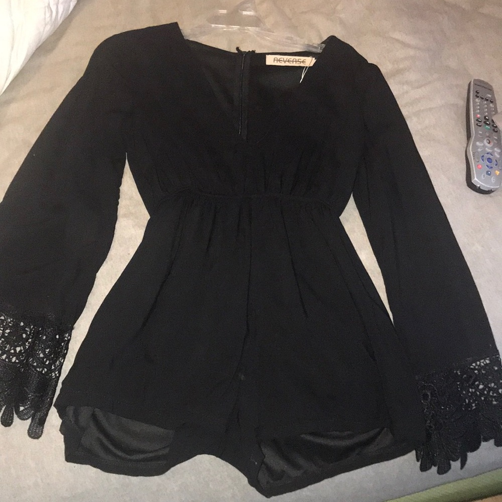 Black romper flare detailed sleeves